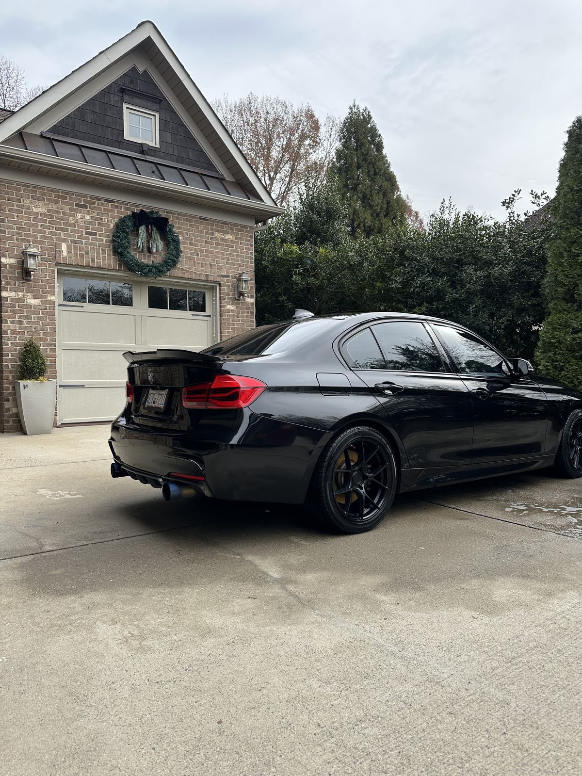 Black BMW 340i M Sport, side angle